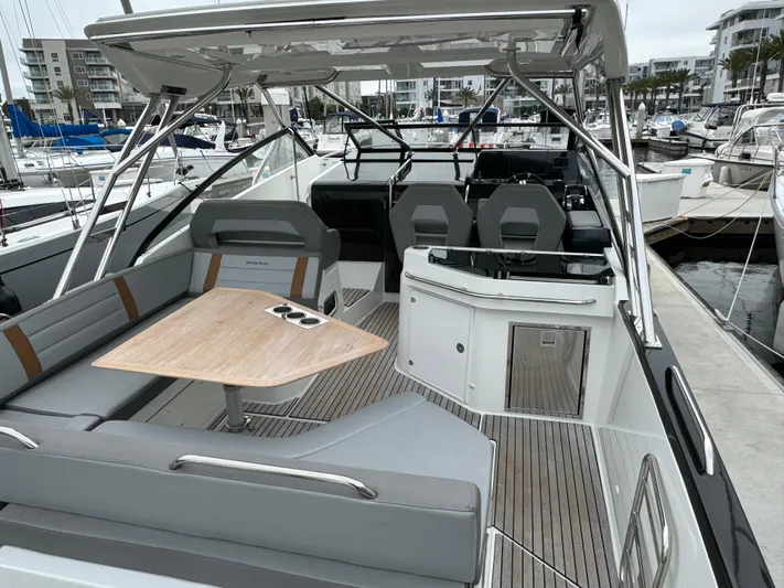 La Bella Vita Yacht Photos Pics 2020 Beneteau Flyer 10 boat, modern design, spacious deck, marina background.