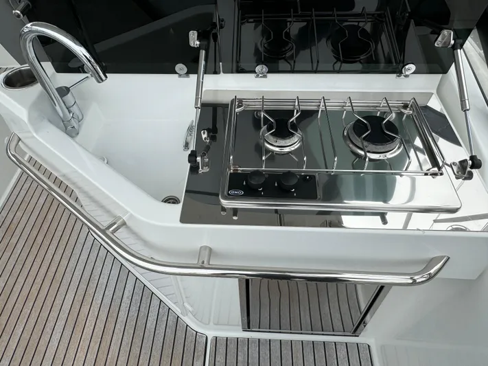 La Bella Vita Yacht Photos Pics Galley area on Beneteau Flyer 10, 2020 model, featuring stove and sink.