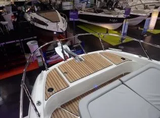 La Bella Vita Yacht Photos Pics Beneteau Flyer 10, 2020, displayed at a boat show.