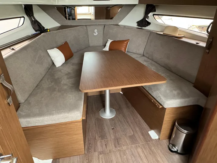 La Bella Vita Yacht Photos Pics Interior of 2020 Beneteau Flyer 10 yacht with cozy seating area.