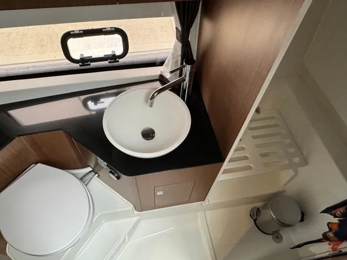 La Bella Vita Yacht Photos Pics Interior of 2020 Beneteau Flyer 10 with sink and toilet.