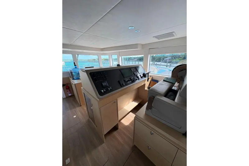 Silent Seven Yacht Photos Pics Interior of 2020 Silent 55 yacht cockpit with modern navigation controls and panoramic windows.