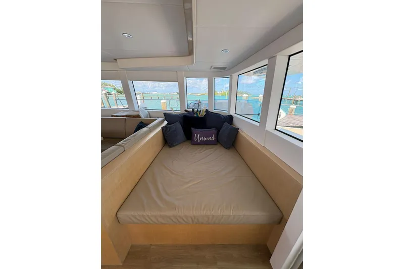 Silent Seven Yacht Photos Pics Interior of 2020 Silent 55 yacht with cozy seating and ocean view.