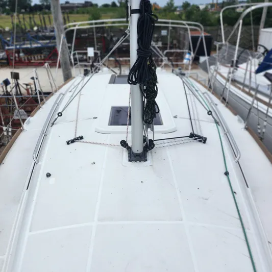 Skye Yacht Photos Pics 2023 Jeanneau Sun Odyssey 349 sailboat deck with rigging and hatches.