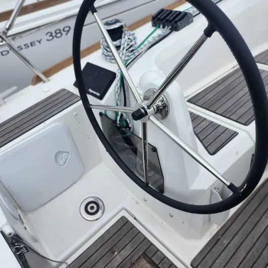 Skye Yacht Photos Pics 2023 Jeanneau Sun Odyssey 349 cockpit with steering wheel and deck details.