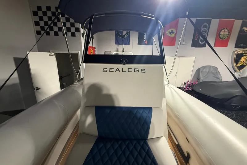 7.5m Hydrasol Rib Yacht Photos Pics 2021 Sealegs 7.5M RIB boat interior with blue seating and canopy.