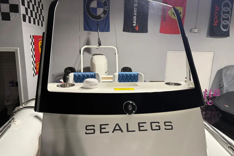 7.5m Hydrasol Rib Yacht Photos Pics 2021 Sealegs 7.5M RIB boat in showroom with automotive banners.