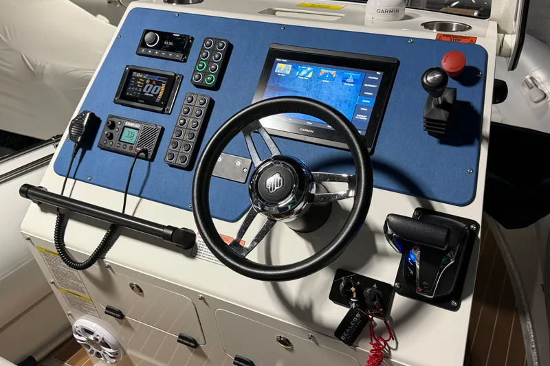 7.5m Hydrasol Rib Yacht Photos Pics Sealegs 7.5M RIB 2021 dashboard with steering wheel, controls, and navigation display.
