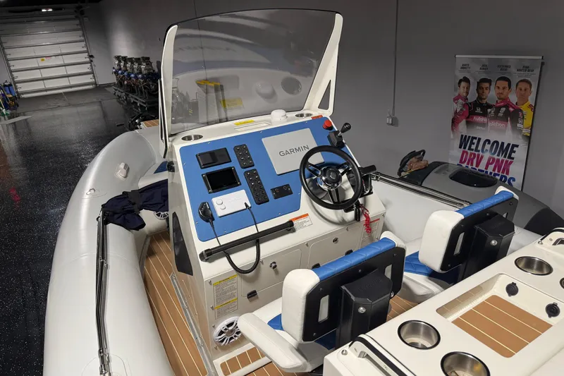 7.5m Hydrasol Rib Yacht Photos Pics 2021 Sealegs 7.5M RIB with Garmin navigation system in a showroom setting.