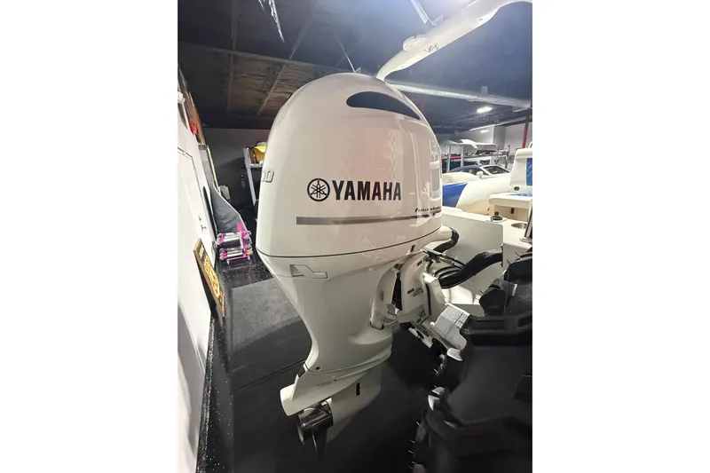7.5m Hydrasol Rib Yacht Photos Pics Yamaha outboard motor on 2021 Sealegs 7.5M RIB in a showroom setting.