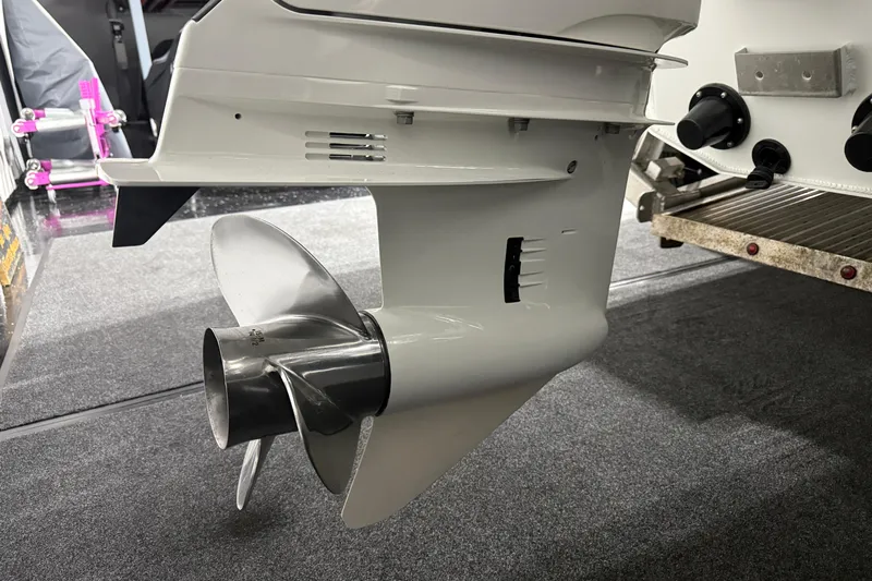 7.5m Hydrasol Rib Yacht Photos Pics 2021 Sealegs 7.5M RIB outboard motor propeller in a garage setting.