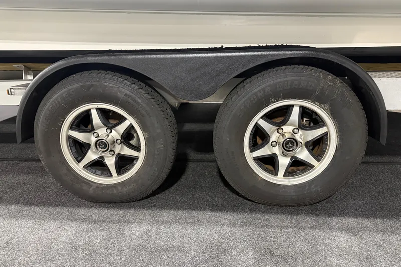 7.5m Hydrasol Rib Yacht Photos Pics Trailer wheels of a 2021 Sealegs 7.5M RIB, featuring dual tires and alloy rims.