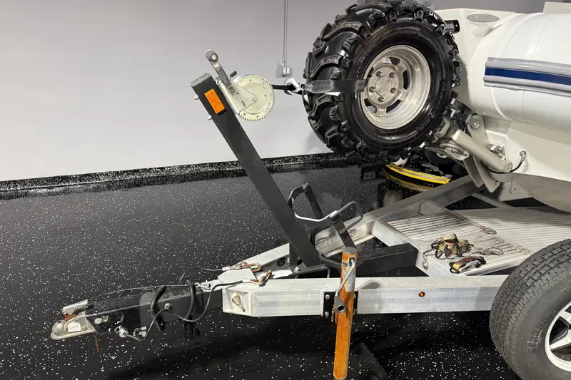 7.5m Hydrasol Rib Yacht Photos Pics 2021 Sealegs 7.5M RIB on trailer with rugged tires in a garage setting.