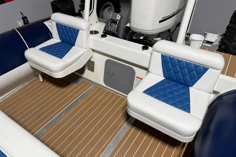 7.5m Hydrasol Rib Yacht Photos Pics 2021 Sealegs 7.5M RIB interior with blue and white cushioned seats.