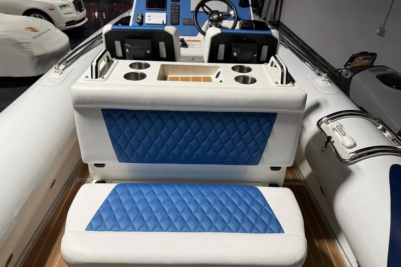 7.5m Hydrasol Rib Yacht Photos Pics 2021 Sealegs 7.5M RIB interior with blue quilted seats and modern dashboard.