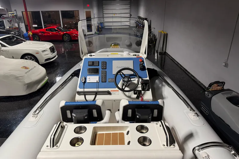 7.5m Hydrasol Rib Yacht Photos Pics 2021 Sealegs 7.5M RIB in a luxury garage with sports cars.