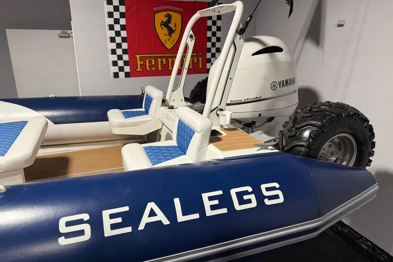 7.5m Hydrasol Rib Yacht Photos Pics Sealegs 7.5M RIB 2021 with Yamaha engine, displayed indoors near Ferrari banner.