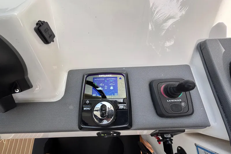  Yacht Photos Pics 2024 Pursuit OS 445 Offshore control panel with Zipwake and Lewmar systems.