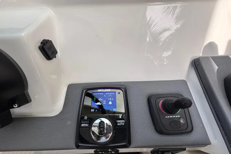  Yacht Photos Pics 2024 Pursuit OS 445 Offshore control panel with Zipwake and Lewmar systems.