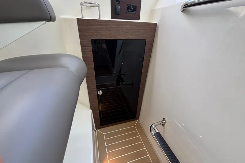  Yacht Photos Pics 2024 Pursuit OS 445 Offshore cabin interior with sleek design and modern finishes.