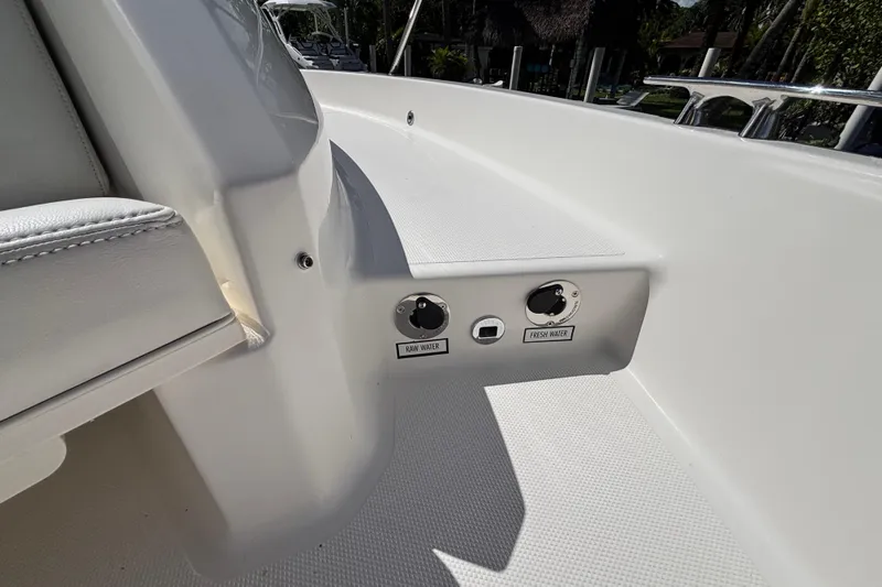  Yacht Photos Pics 2024 Pursuit OS 445 Offshore boat deck with raw and fresh water controls.