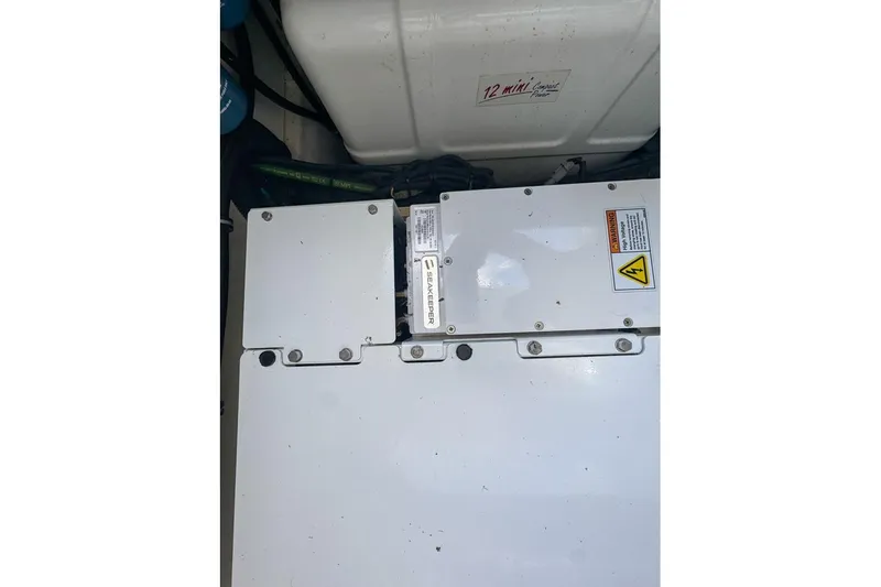  Yacht Photos Pics Engine compartment of 2024 Pursuit OS 445 Offshore boat with Seakeeper system.