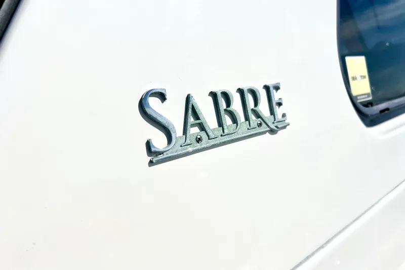 Island Time Yacht Photos Pics 2006 Sabre 38 Hard Top Express logo on white surface.