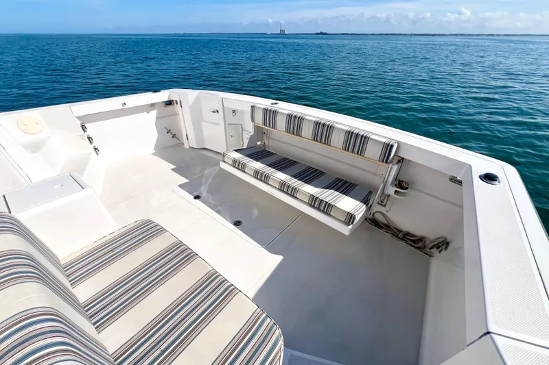 Island Time Yacht Photos Pics 2006 Sabre 38 Hard Top Express boat with striped seating on open water.