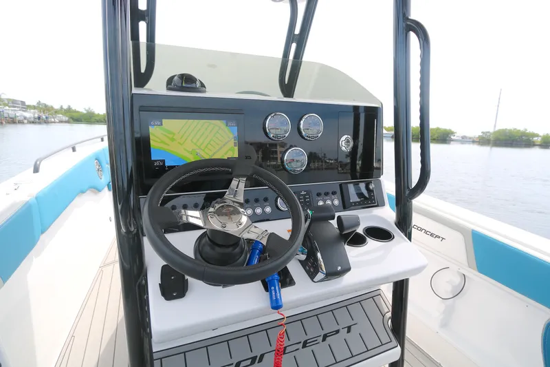  Yacht Photos Pics 2025 Concept 30 Open Deck boat cockpit with modern steering and navigation system.