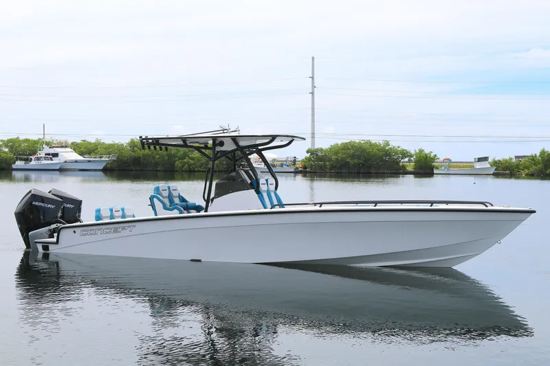  Yacht Photos Pics 2025 Concept 30 Open Deck boat on calm water, featuring sleek design and modern outboard engines.