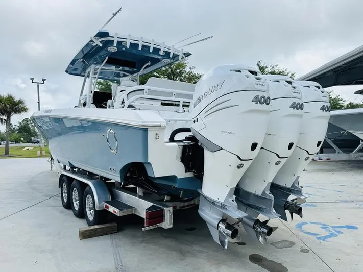  Yacht Photos Pics 2020 Fountain 38cc boat with triple Mercury 400 engines on a trailer.