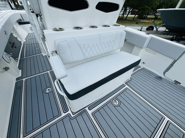  Yacht Photos Pics Fountain 38cc 2020 model boat with white seating and gray deck.