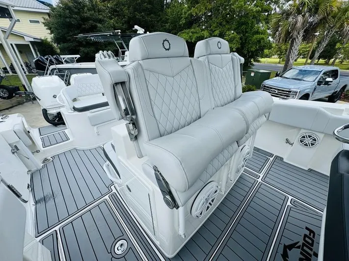  Yacht Photos Pics 2020 Fountain 38cc boat with luxurious seating and modern design.