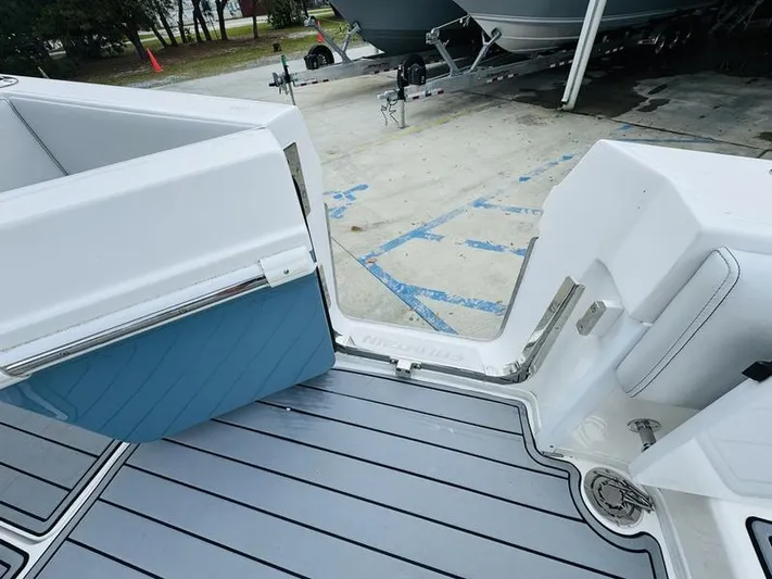  Yacht Photos Pics 2020 Fountain 38cc boat deck with open transom door.