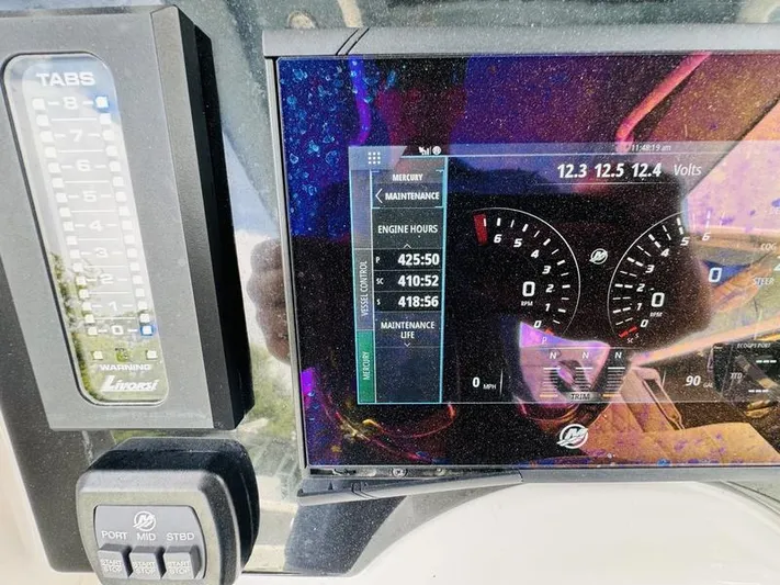  Yacht Photos Pics Fountain 38cc 2020 boat dashboard with engine hours and maintenance display.