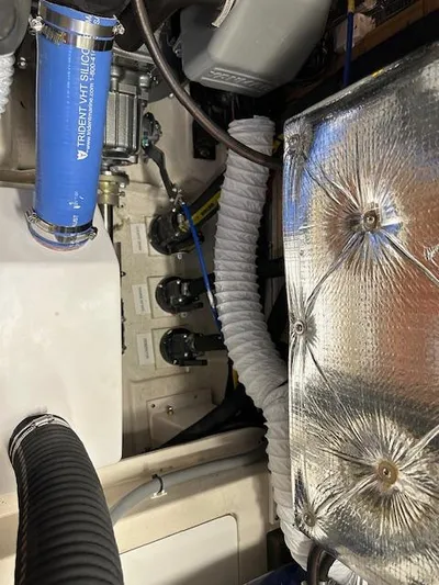 C426 #115 Yacht Photos Pics Engine compartment of a 2025 Catalina 426 boat, featuring hoses and insulation.