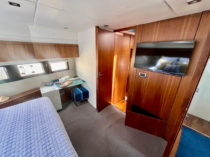  Yacht Photos Pics Luxurious cabin interior of 2013 Fairline Targa 50 GT yacht with modern amenities.