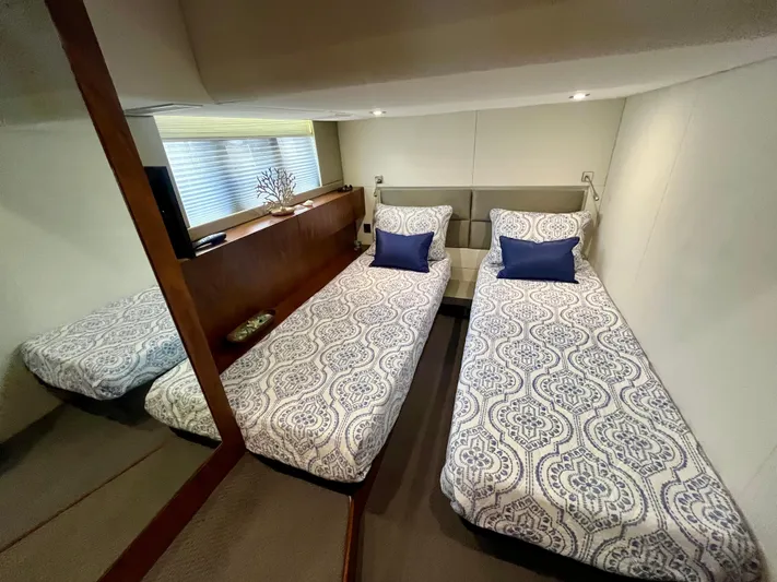  Yacht Photos Pics Interior of 2013 Fairline Targa 50 GT yacht with twin beds and elegant decor.