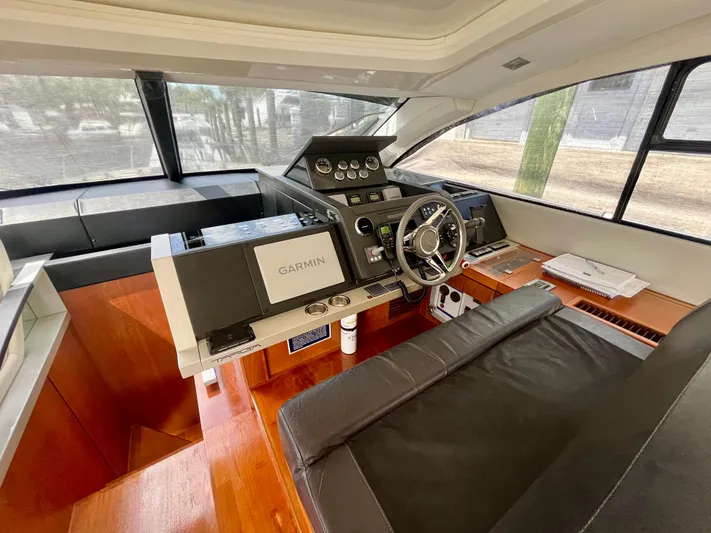  Yacht Photos Pics 2013 Fairline Targa 50 GT yacht helm with Garmin navigation system and luxurious interior.