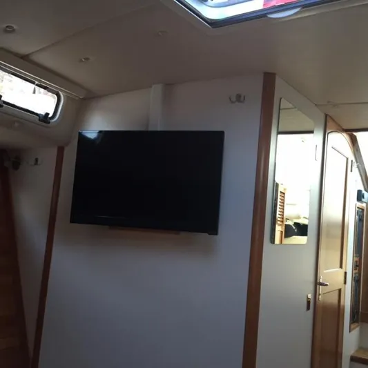  Yacht Photos Pics Interior of 2016 MJM 36Z yacht with mounted flat-screen TV.