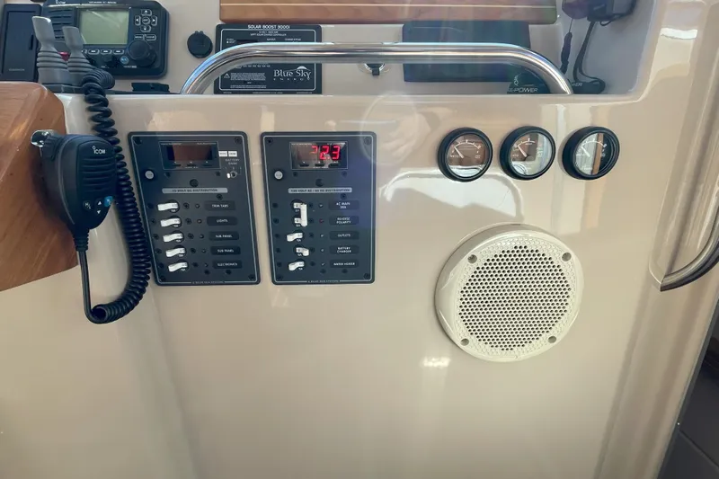 Sweet Jane Yacht Photos Pics Control panel of a 2015 Aspen C100 boat with gauges and communication equipment.