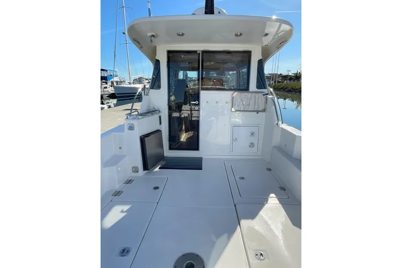 Sweet Jane Yacht Photos Pics 2015 Aspen C100 boat deck with sleek design and modern features.