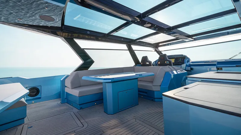 Chapter 3 Yacht Photos Pics Luxurious interior of 2024 Vanquish Yachts VQ70 with sleek seating and panoramic windows.