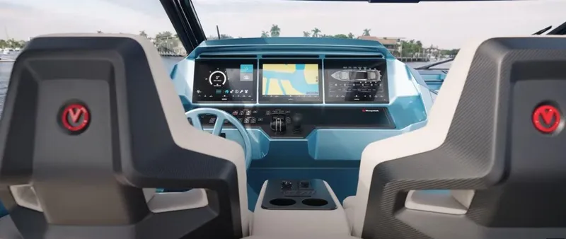 Chapter 3 Yacht Photos Pics 2024 Vanquish Yachts VQ70 cockpit with advanced navigation displays and modern steering wheel.