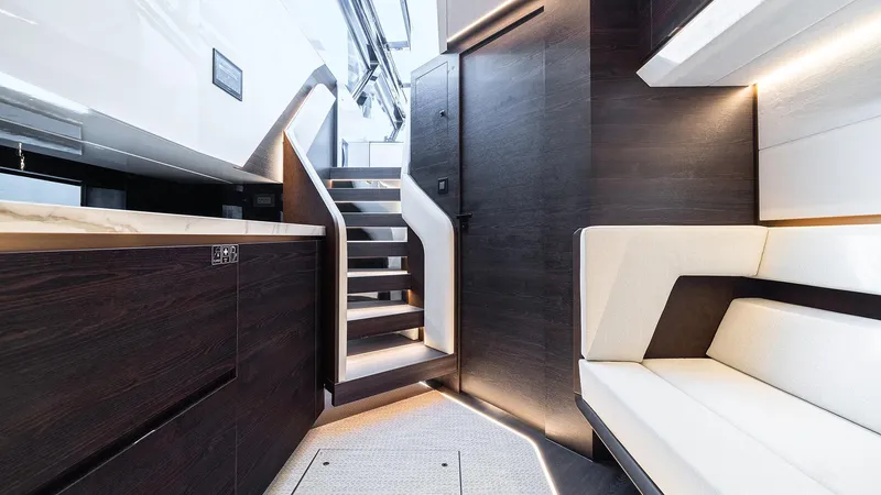 Chapter 3 Yacht Photos Pics Luxurious interior of 2024 Vanquish Yachts VQ70 with modern design and elegant lighting.