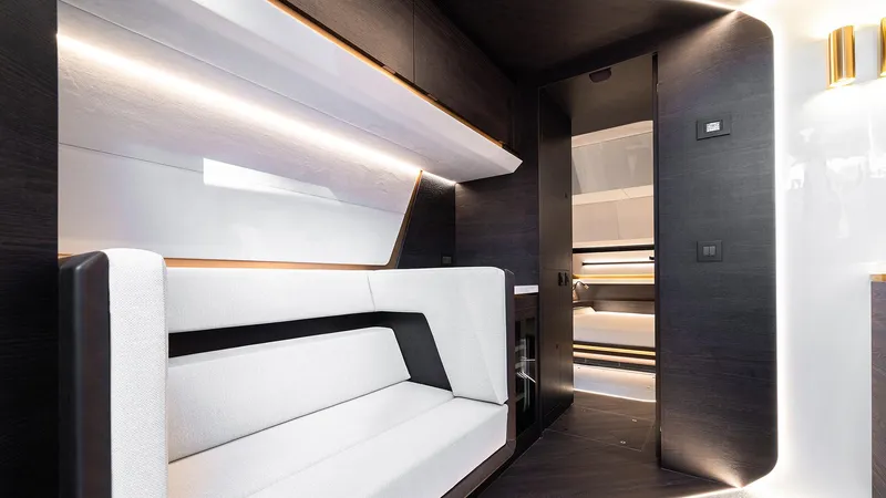 Chapter 3 Yacht Photos Pics Luxurious interior of 2024 Vanquish Yachts VQ70, featuring modern seating and sleek design elements.