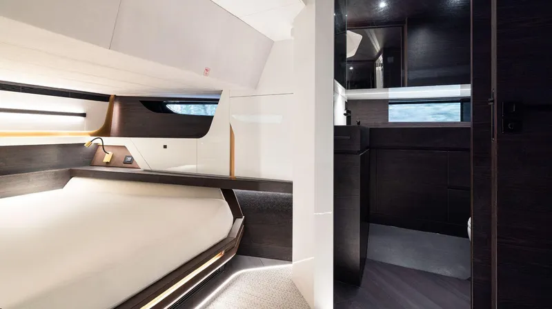 Chapter 3 Yacht Photos Pics 2024 Vanquish Yachts VQ70 interior cabin with modern design and luxurious amenities.