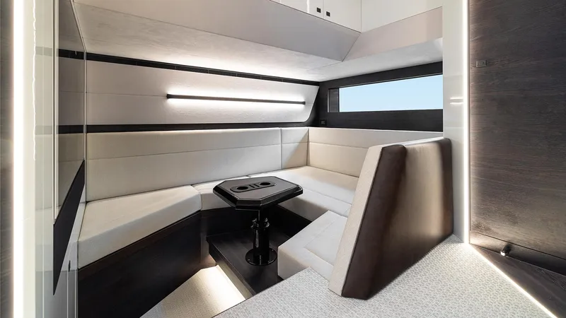 Chapter 3 Yacht Photos Pics Luxurious interior of 2024 Vanquish Yachts VQ70 with modern seating and sleek design.
