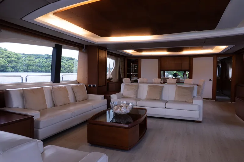 Camy Ed Yacht Photos Pics Luxurious interior of 2006 Azimut 105 Grande yacht with elegant seating and modern design.