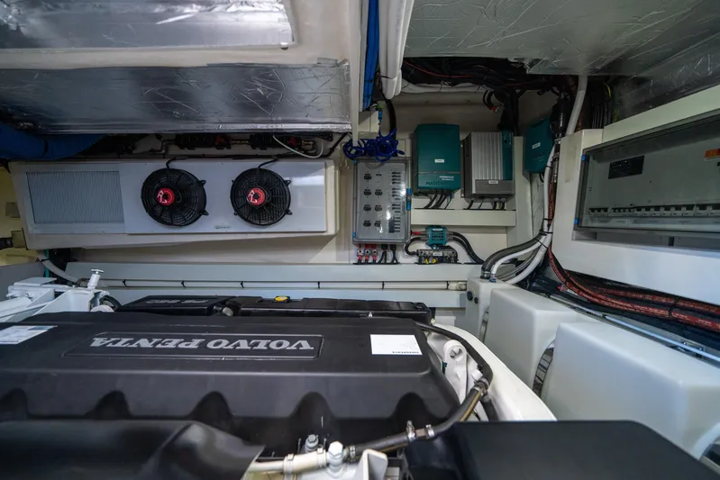 Water Dog Yacht Photos Pics Engine room of 2024 Riviera 5400 Sport Yacht with Volvo Penta engine and electrical systems.